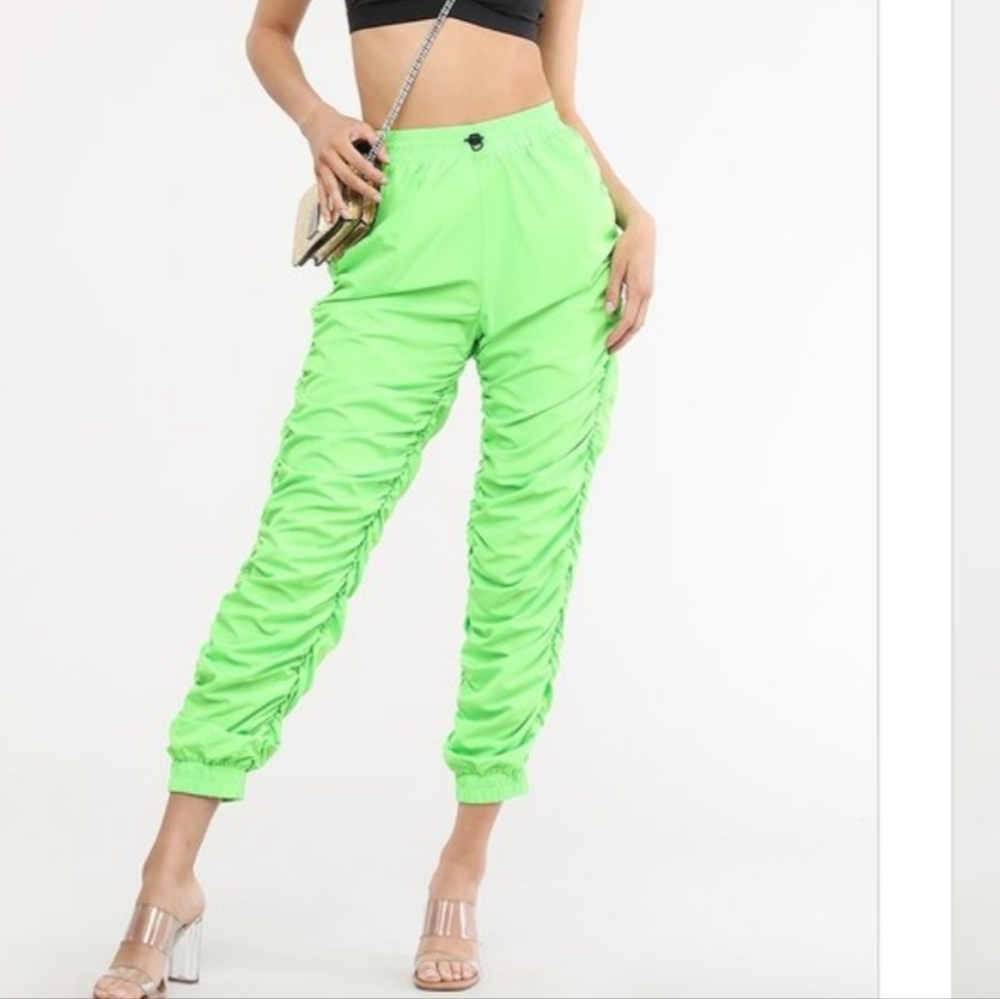 LABIJOU bright green ruched joggers with drawstring closer.Size large.